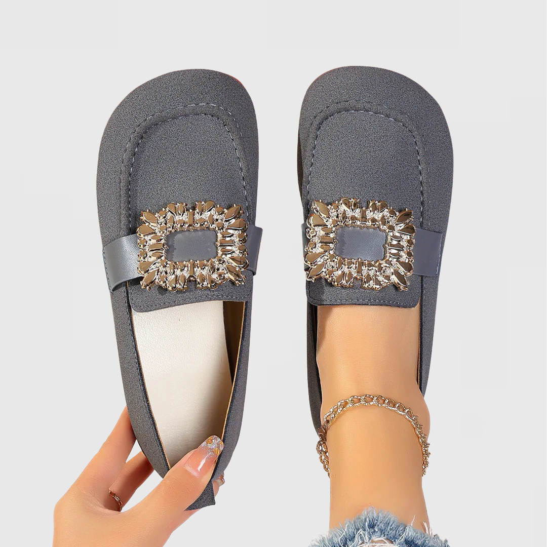 Women's brown comfort loafers with cushioned insole, ergonomic support, and polished refined silhouette