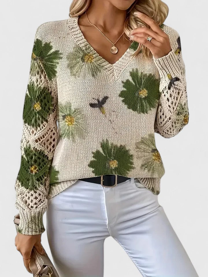 Elegant lightweight floral sweater in soft feminine hues, cozy knit with delicate floral pattern