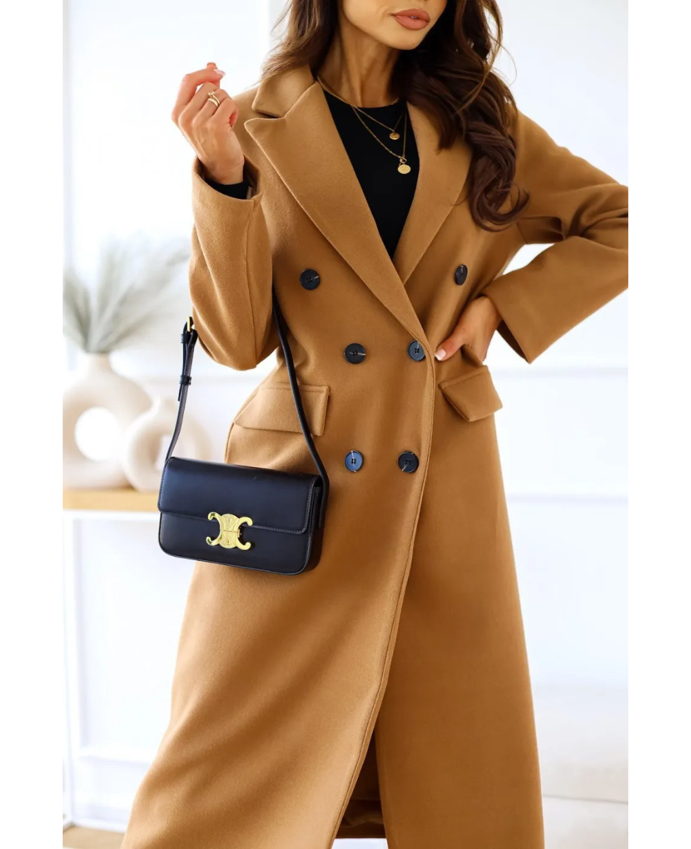 Beige fitted double-breasted trench coat with notched lapel and tailored silhouette