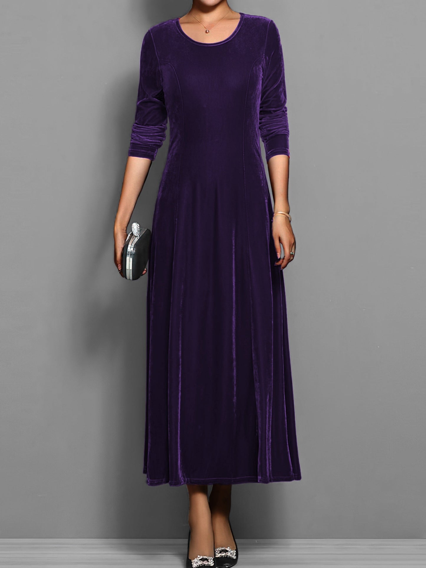 Soft velvet midi dress in rich jewel tone with elegant fitted silhouette and luxurious texture