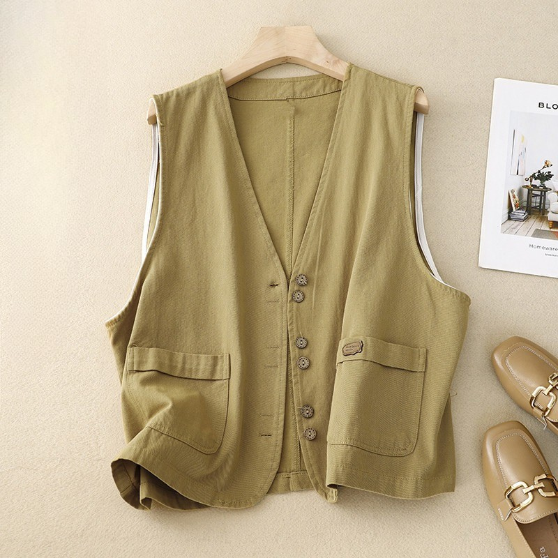 Relaxed button-front vest in neutral tones with soft drape, patch pockets, and natural buttons