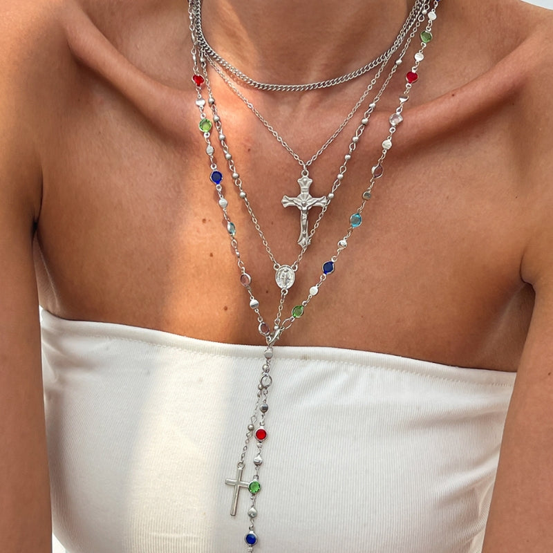 Lioré 4-piece cross necklace set with matte and shine chains, crystal pendants, layered styling