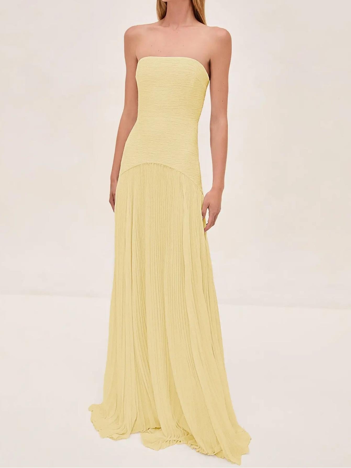 Sage green strapless pleated maxi dress with structured bodice and sweeping full-length formal skirt