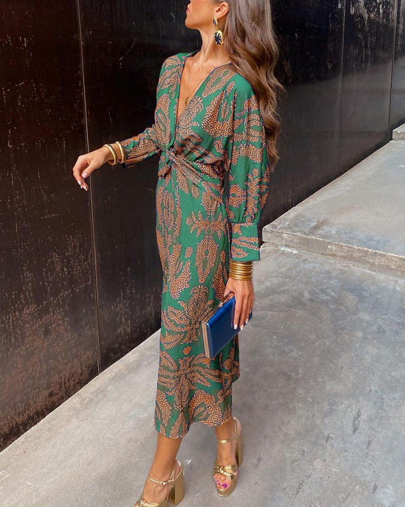 Women's flowy maxi dress deep V-neck knot waist detail 3/4 sleeves elegant silhouette