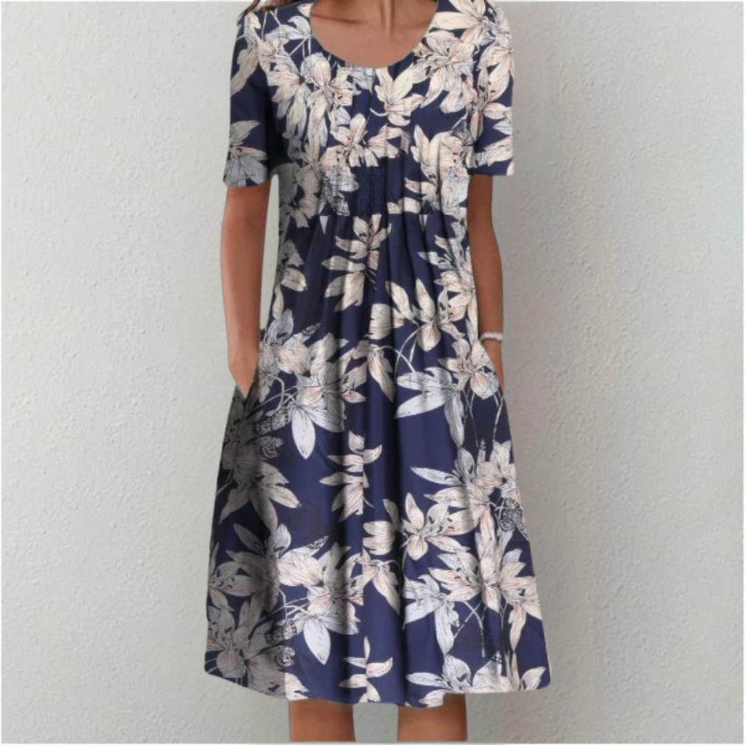 Casual floral dress with flattering silhouette and practical side pockets for effortless everyday style