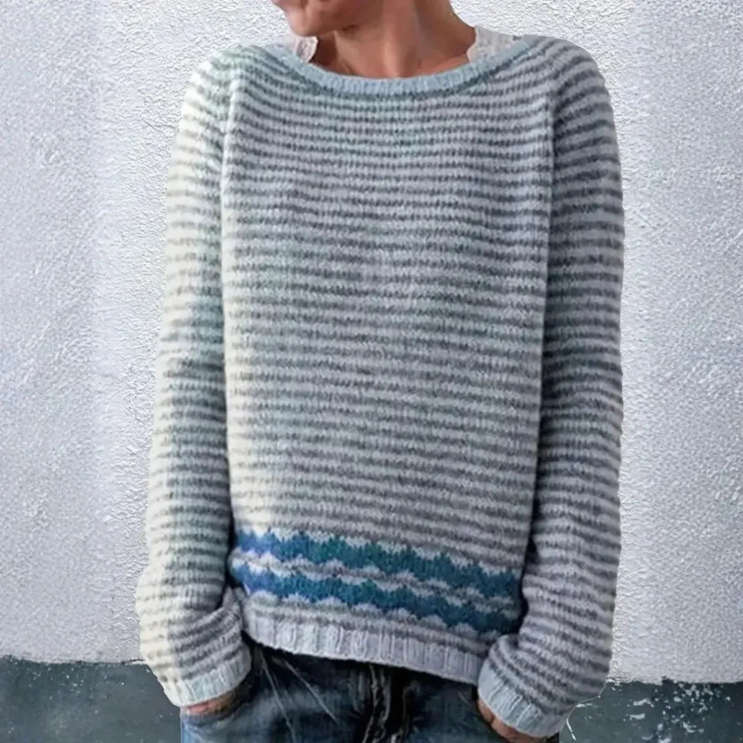 Lulu striped knit sweater with relaxed fit, ribbed cuffs, and contrast wave hem detail