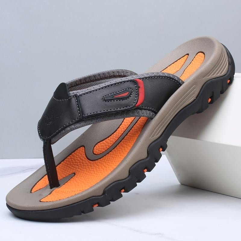Brown leather sandals with structured straps and cushioned shock-absorbing sole for all-day comfort