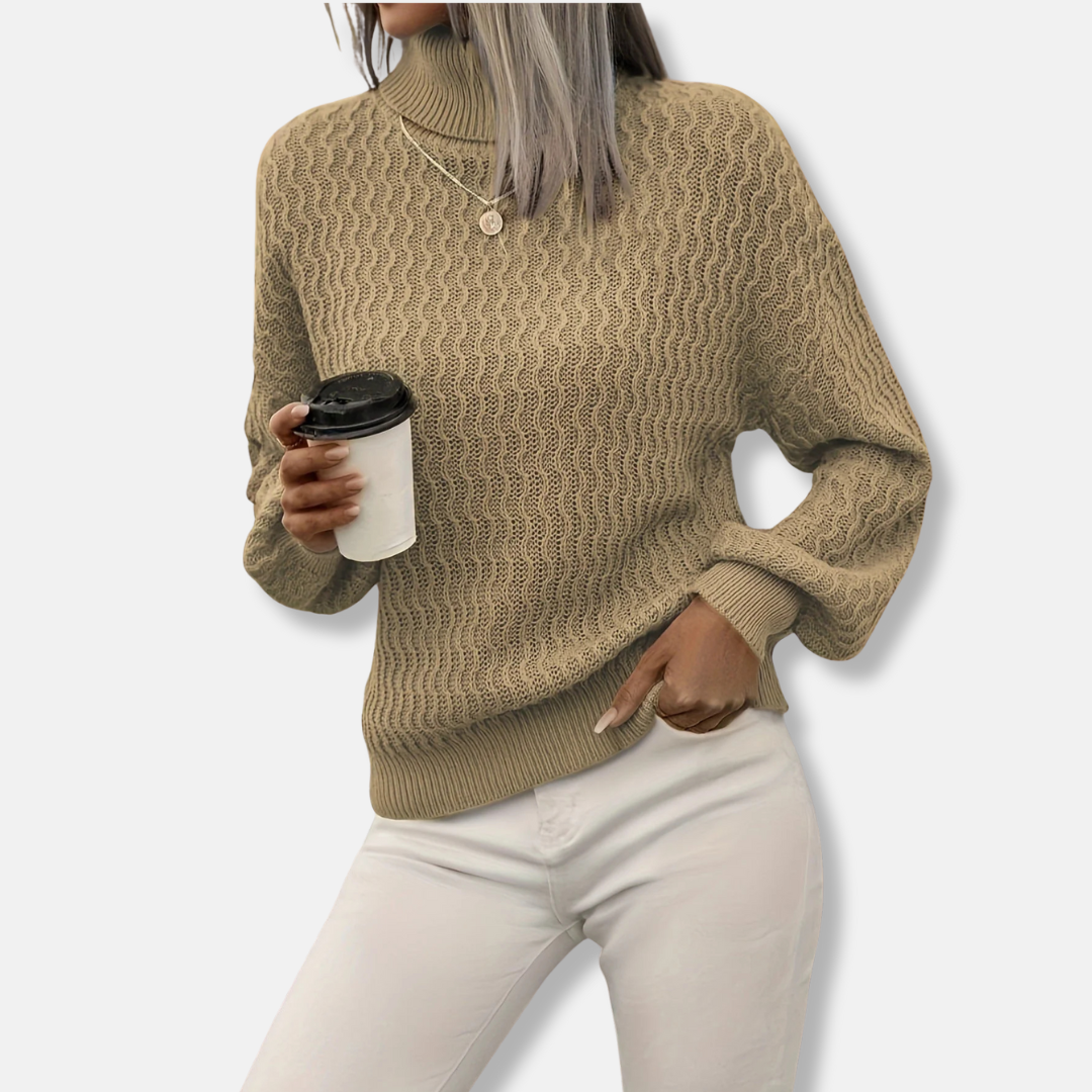 Women's ivory knit turtleneck sweater with dramatic balloon sleeves and relaxed luxurious fit