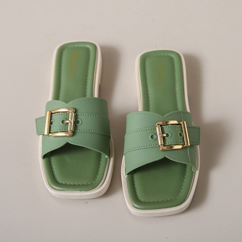 Beige comfort sandals with sculptural square toe, curved strap, and gold-finish hardware for all-day comfort