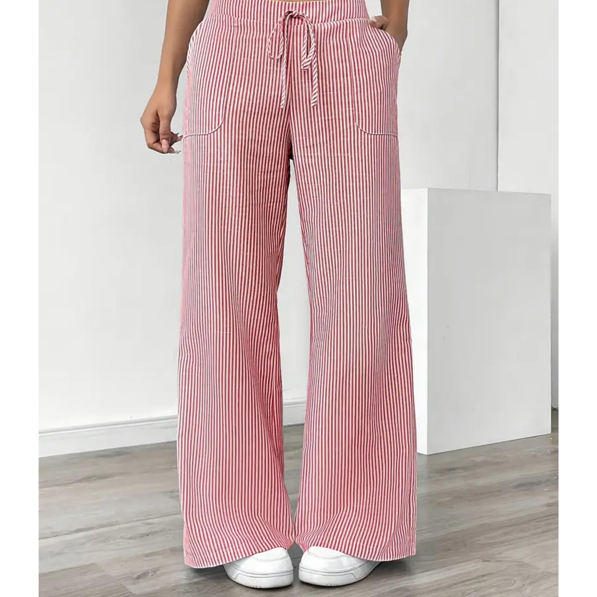 Striped wide-leg pants with adjustable waistband, flattering vertical pattern and side pockets