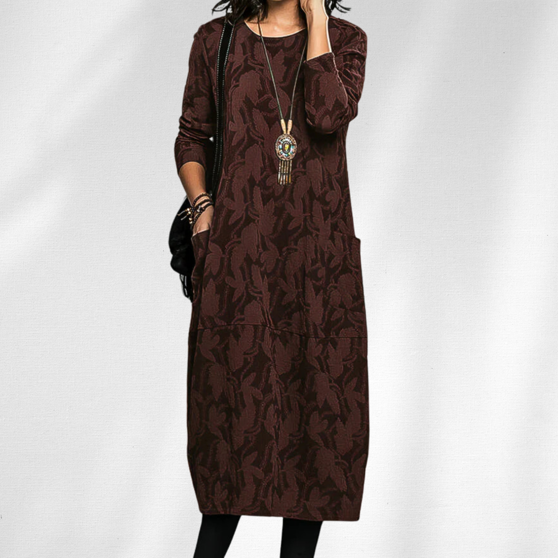 Elegant black crewneck winter dress with cozy premium knit fabric and slim silhouette