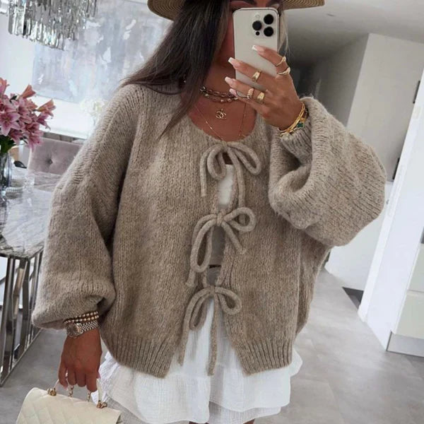 Linoire textured knit cardigan in neutral tone with soft structure and distinctive knot tie closure
