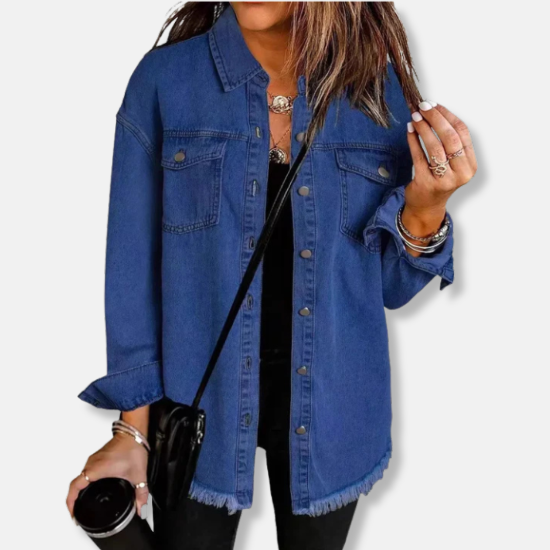 Women's oversized denim shacket in blue with button front closure and raw edge hem