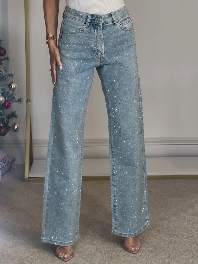 High-rise straight leg jeans with all-over rhinestone embellishments for a glamorous denim look