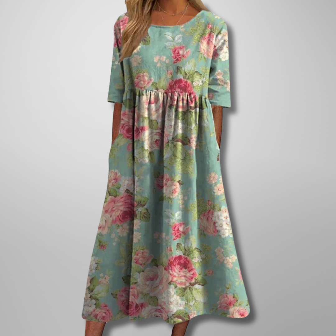 Relaxed floral midi dress with flowing cut in feminine print, perfect for effortless everyday elegance