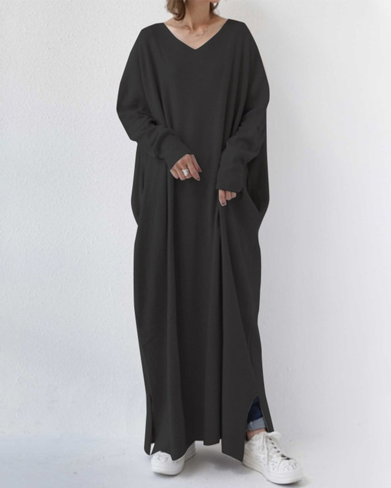 Women's elegant winter maxi dress with long sleeves, flowing silhouette in refined cold-weather style