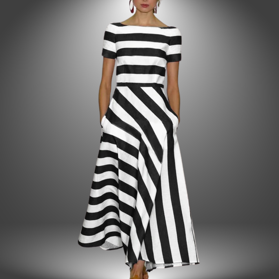 Handcrafted striped maxi dress with flowing silhouette and artisan detailing for effortless elegant style
