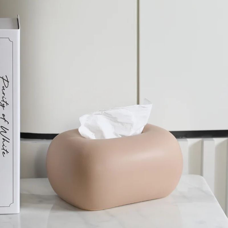 Handcrafted ceramic tissue box with smooth finish, clean lines, and neutral tones for any room