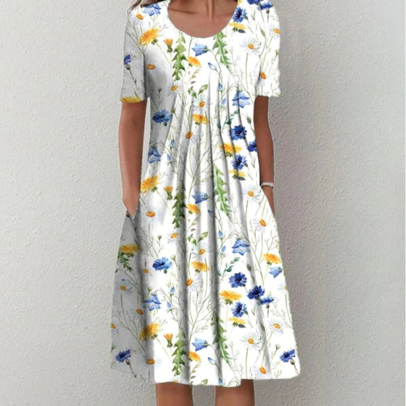 Casual floral dress with flattering silhouette, feminine print, and functional pockets for effortless everyday style