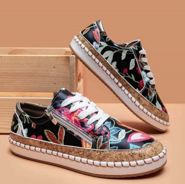 Women's floral embroidered lace-up sneakers with side zip and cork-style platform sole
