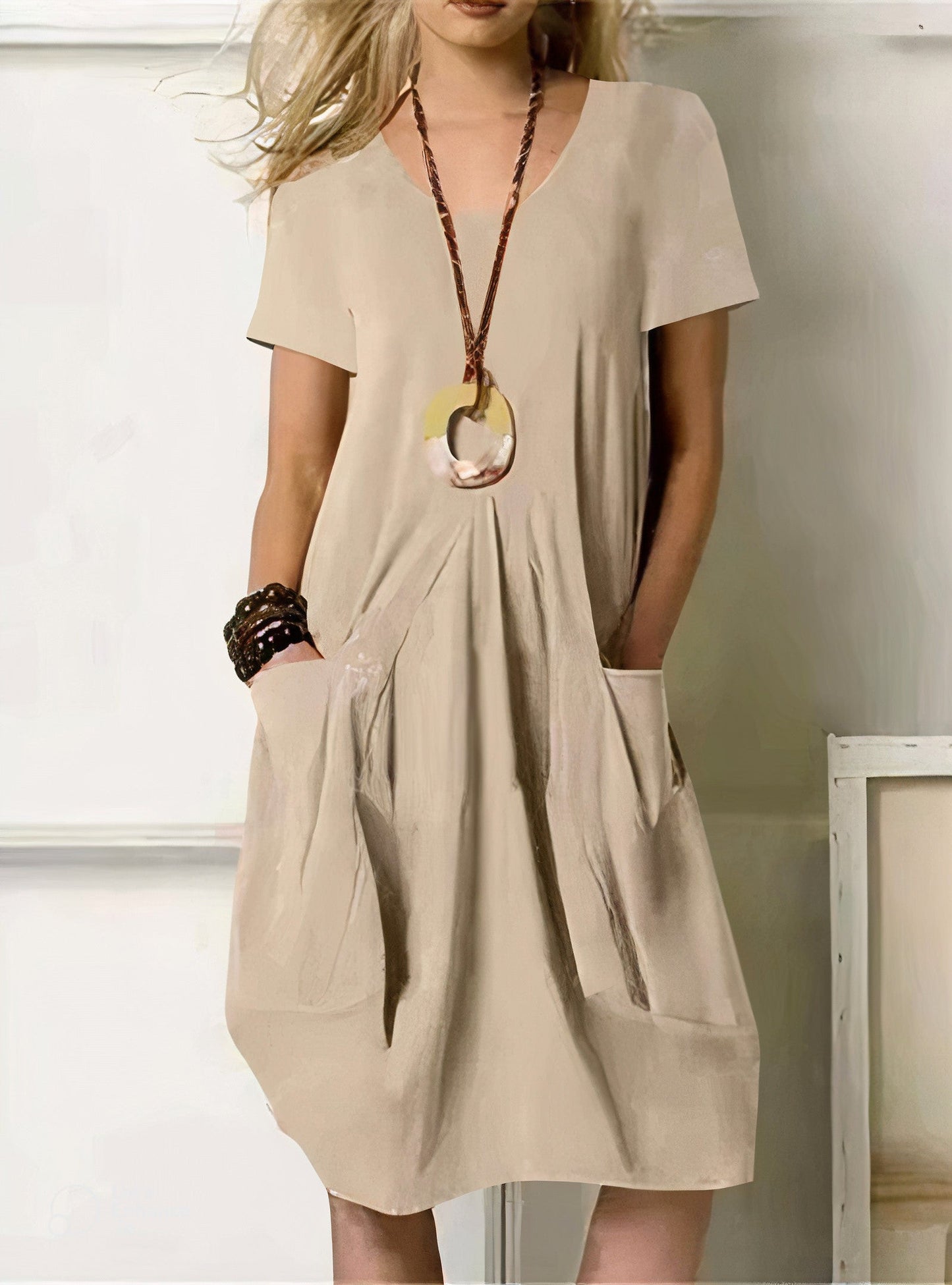 Evelyn relaxed fit midi dress in soft neutral tone with flowing silhouette and effortless drape