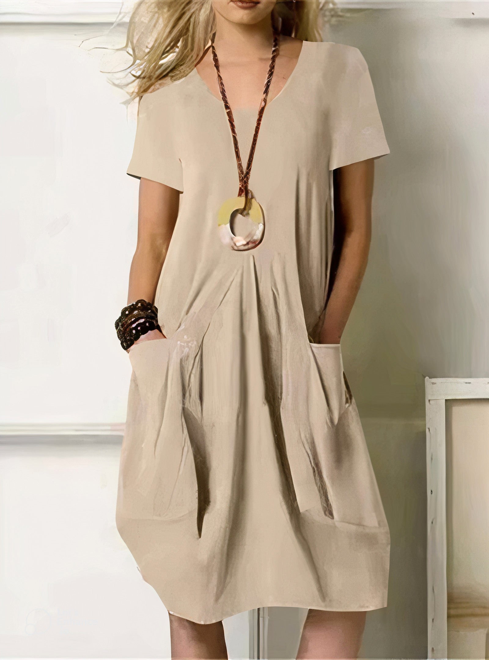 Evelyn relaxed fit midi dress in soft neutral tone with flowing silhouette and effortless drape