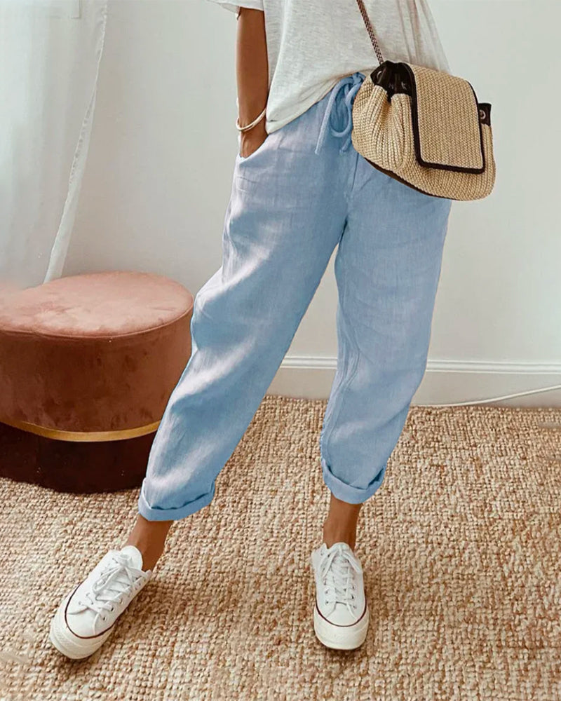 Casual elegant high-waist trousers with soft waistband and flowing breathable cut for women