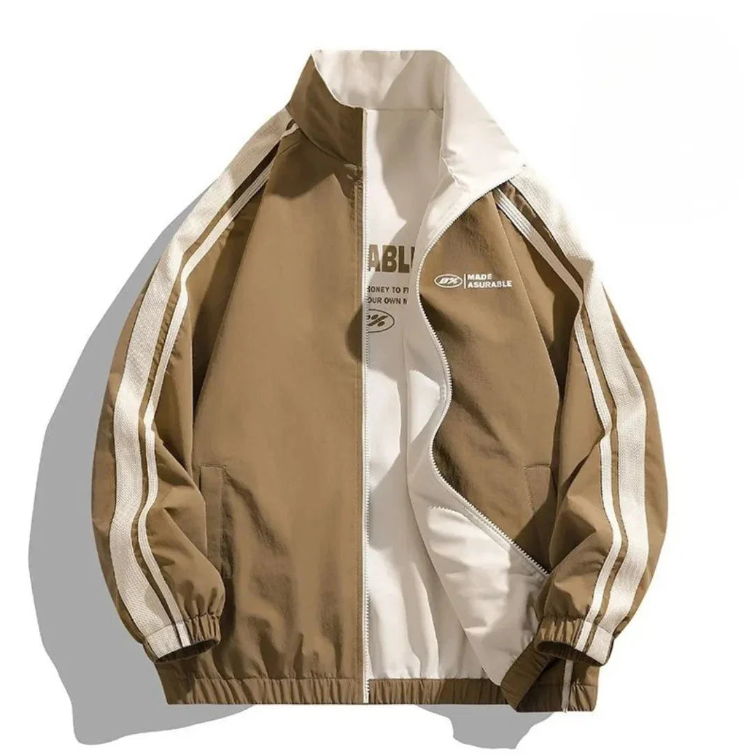 Reversible track jacket in two-tone colorway with sporty stripe detail and windproof lightweight fabric