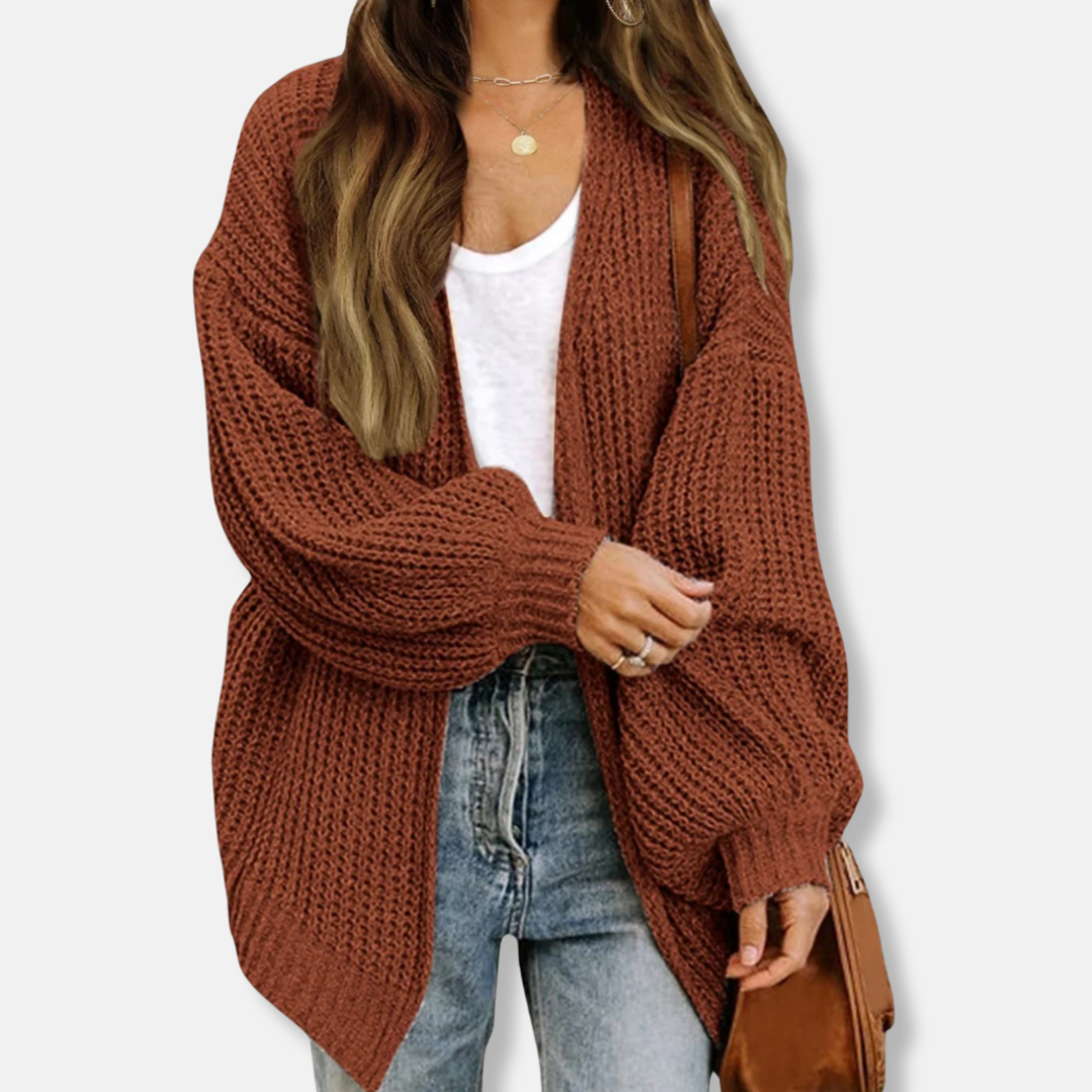 Women's oversized knit cardigan with lantern sleeves and ribbed cuffs for a relaxed refined silhouette