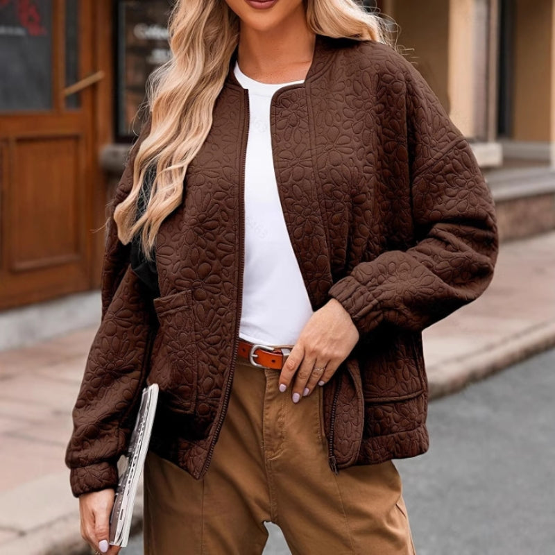 Ferine padded quilted jacket with clean lines, zip closure, and roomy side pockets for cooler months