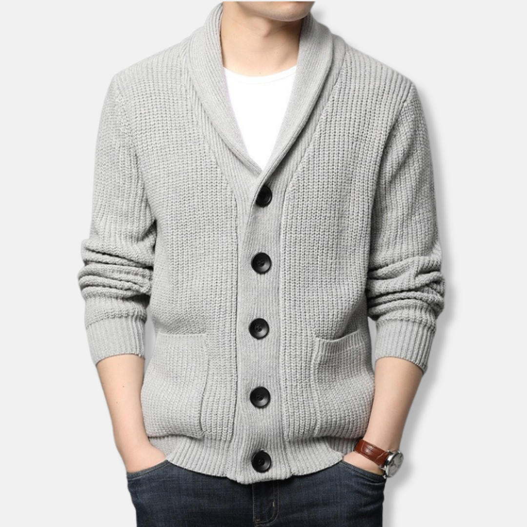 Men's ribbed knit cardigan sweater with shawl collar, button front, and patch pockets in classic style