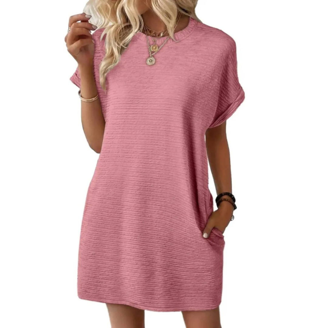 Hot pink ribbed crew neck mini dress with relaxed T-shirt silhouette and short sleeves