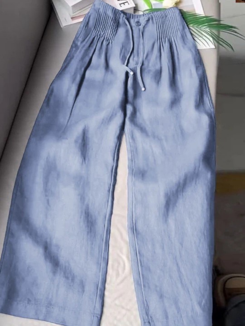 Black wide-leg pants with relaxed fit and flattering silhouette for effortless everyday elegance