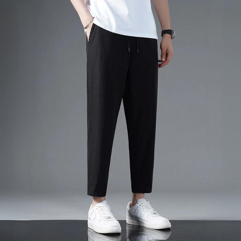 Black athletic stretch pants with second-skin fit, lightweight moisture-wicking fabric for active wear