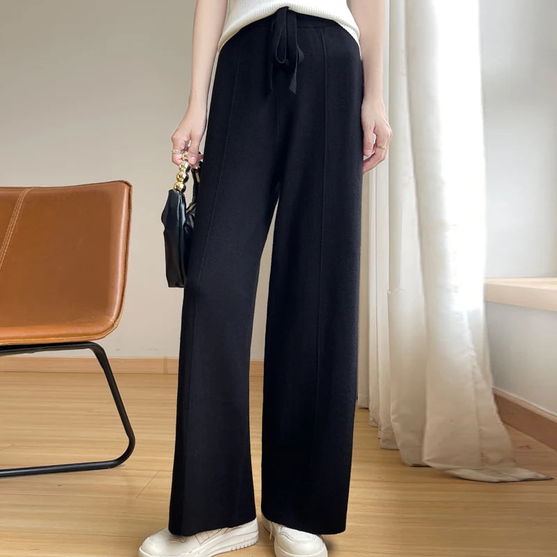 Ivory wide-leg cashmere pants high-waist relaxed silhouette cozy luxurious drape casual chic