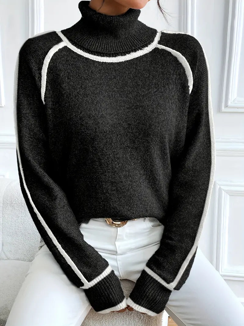 Ivory relaxed-fit turtleneck sweater with velvety knit texture and contrasting seam trim details