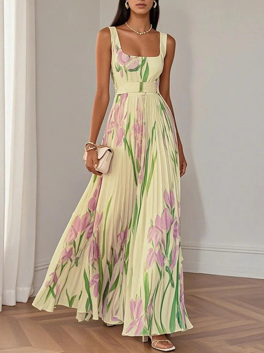 White pleated floral chiffon maxi dress with square neckline and flowing A-line silhouette