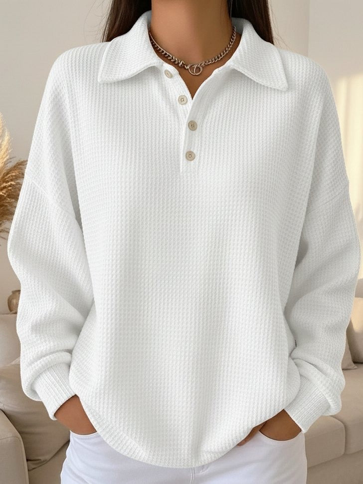 Gray textured polo sweater with classic knit pattern and polished collar for smart-casual style