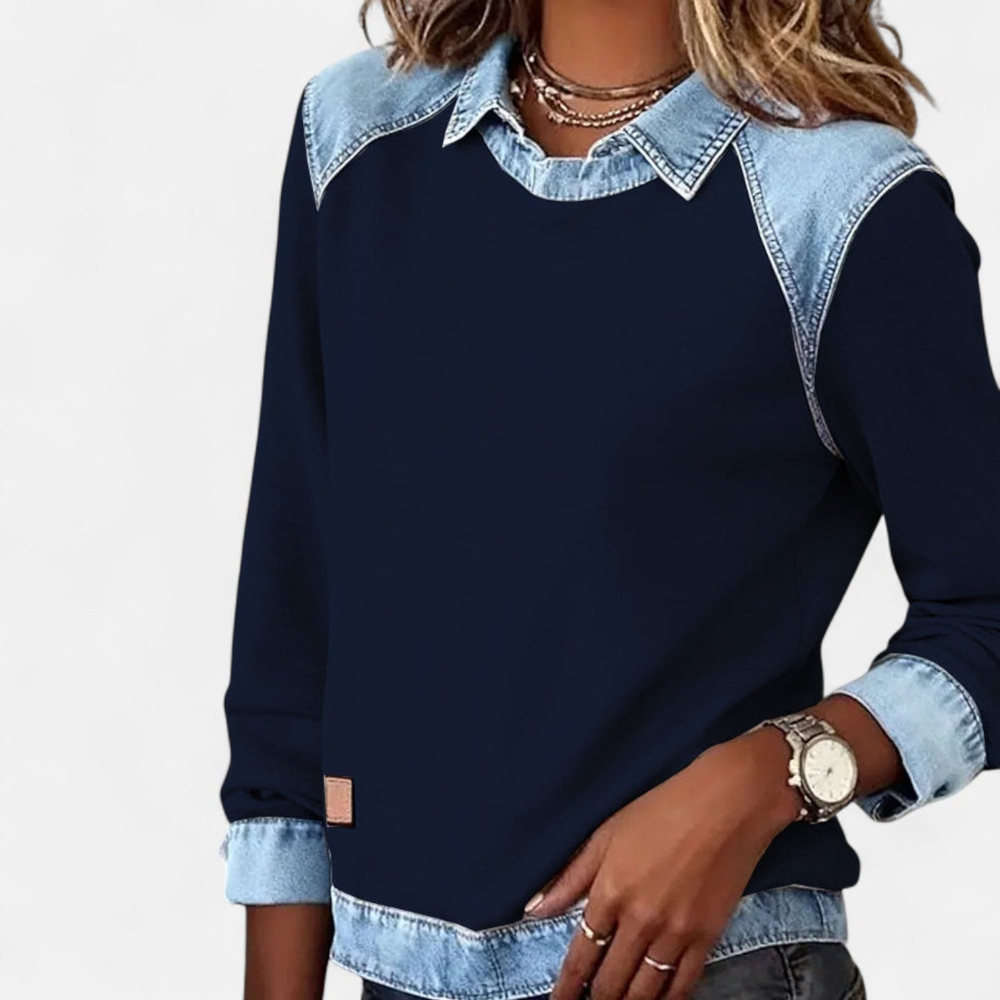 Women's long sleeve sweater in minimalist cut with clean lines and soft flattering fit