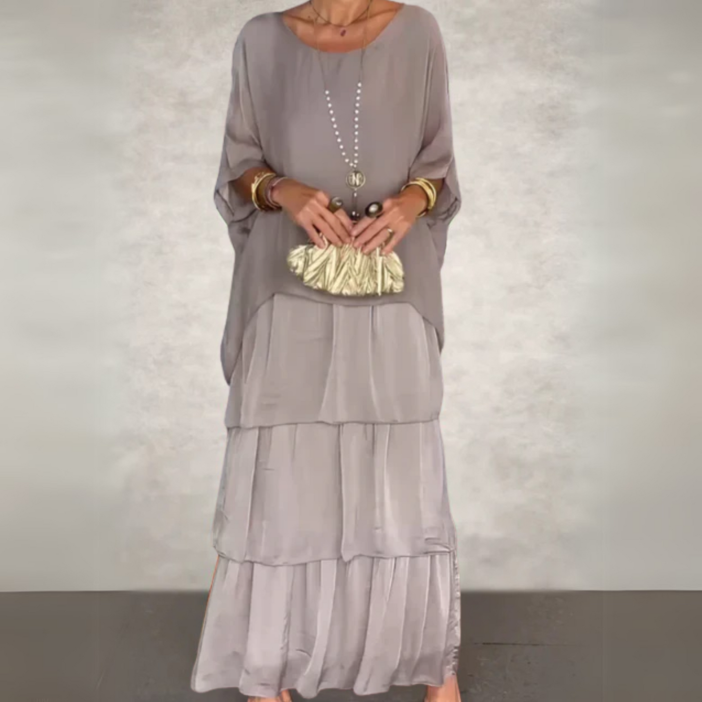 Elegant long flowing dress for women, flattering silhouette, perfect for weddings and summer events