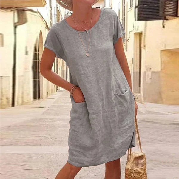 Women's flowy draped dress with tummy control panel, elegant silhouette-enhancing design