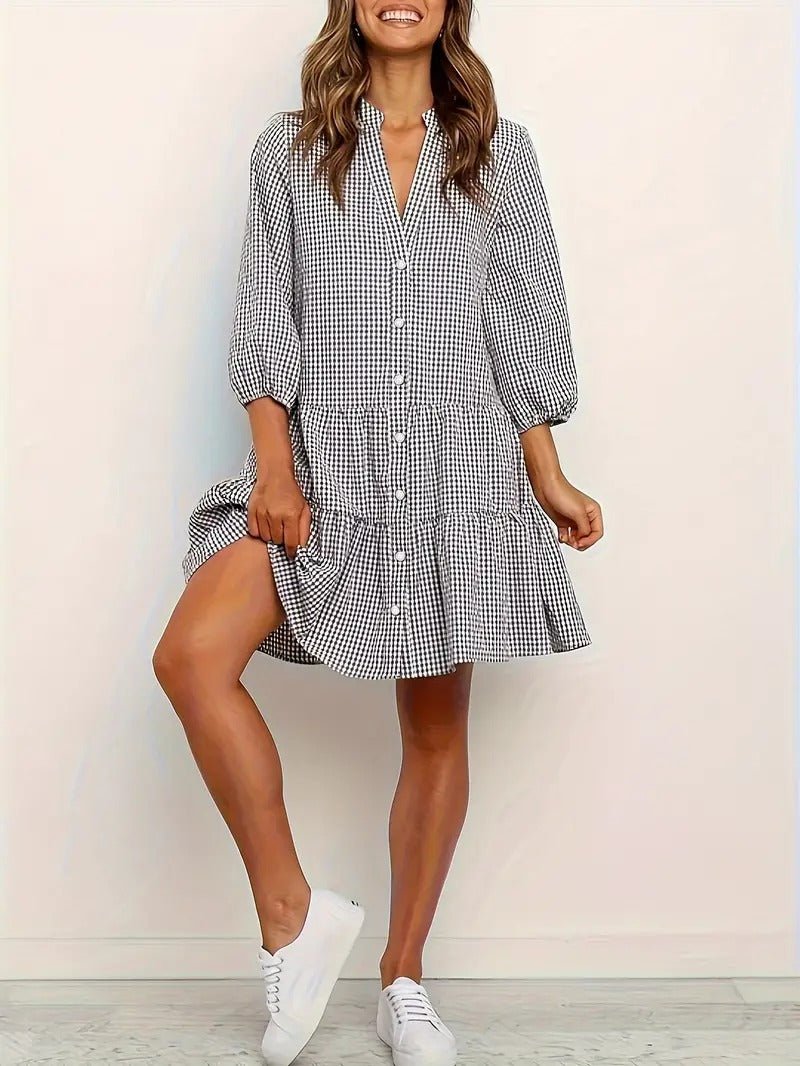 Pink micro-gingham tiered button-down mini dress with puffed three-quarter sleeves, playful spring style