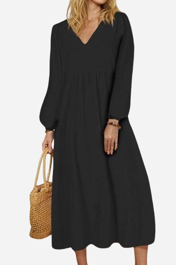Terracotta midi dress with smocked waist, V-neck, and balloon sleeves for effortless feminine style