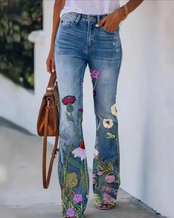 Women's high waist flare jeans in botanical floral print denim with flared hem detail