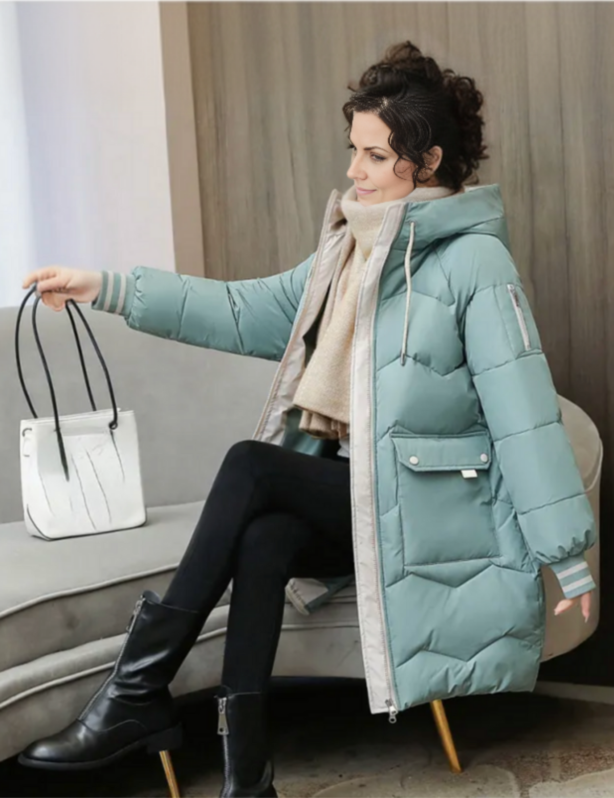 Women's long insulated winter coat in casual sleek silhouette with cozy mid-length warmth-trapping design