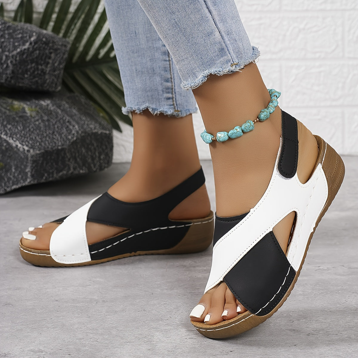 Women's beige comfort sandal with cushioned insole, minimal silhouette, and all-day support