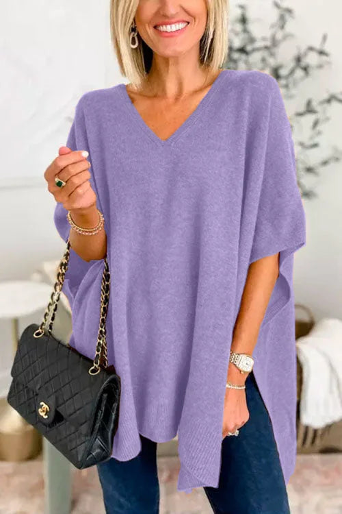 Women's soft knit poncho top loose fit V-neck draped design in neutral tones for fall layering