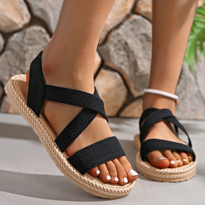 Women's woven espadrille sandals with cushioned sole, feminine design and relaxed elegant style