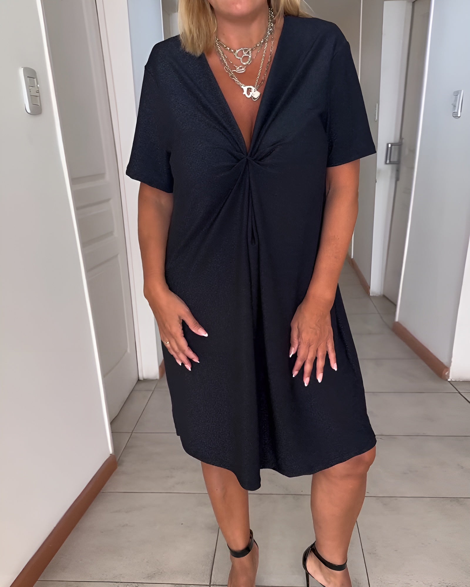 Women's black V-neck ruched evening dress with tummy control and elegant draped silhouette