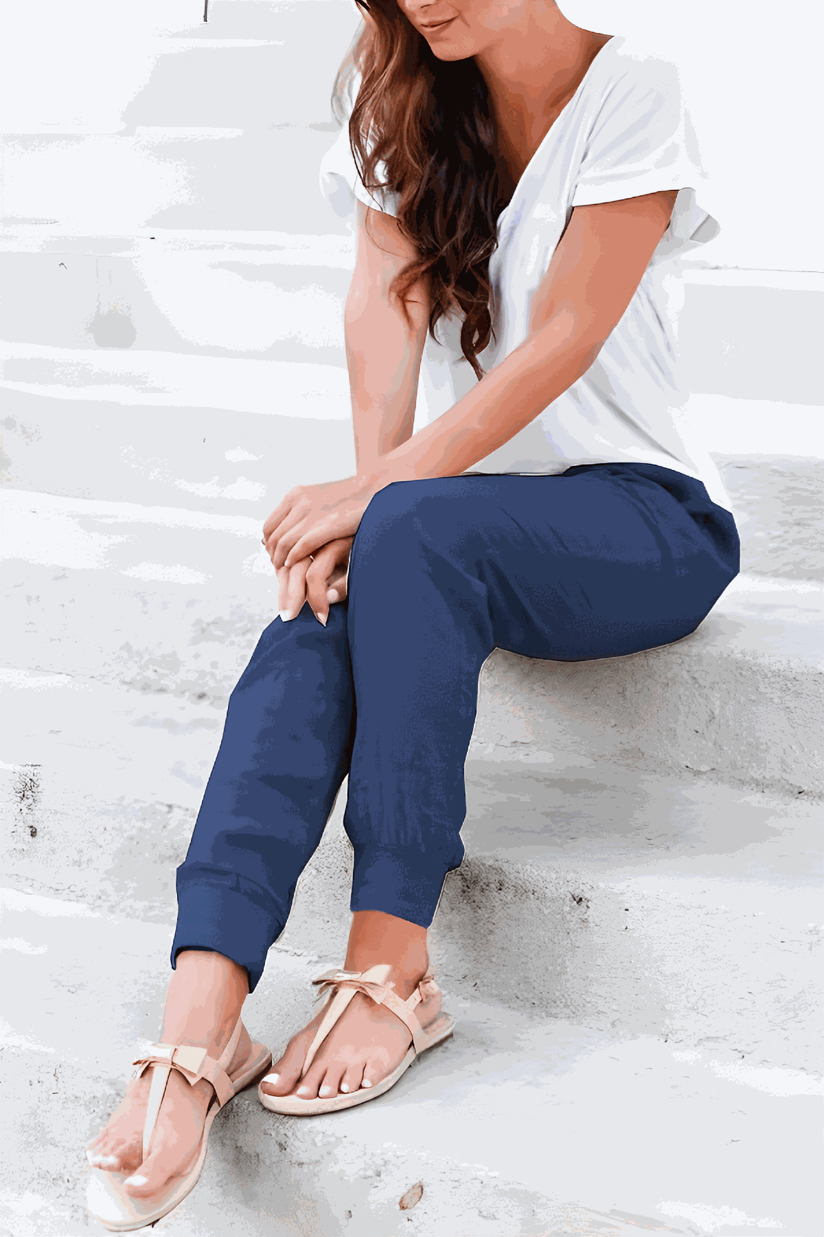 Tan women's tapered jogger pants with drawstring waist and elasticated ankle cuffs